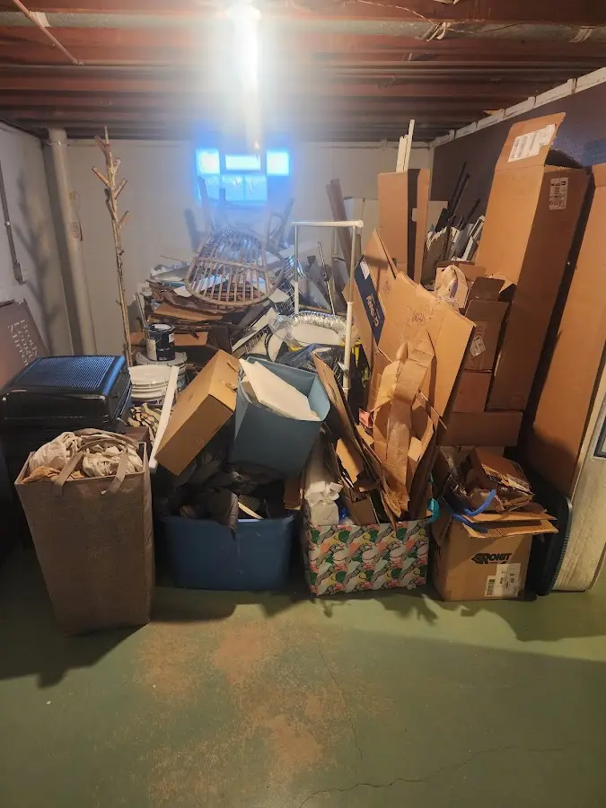 Roll-off dumpster container at job site for Concrete Dumpster Rental in Cortland